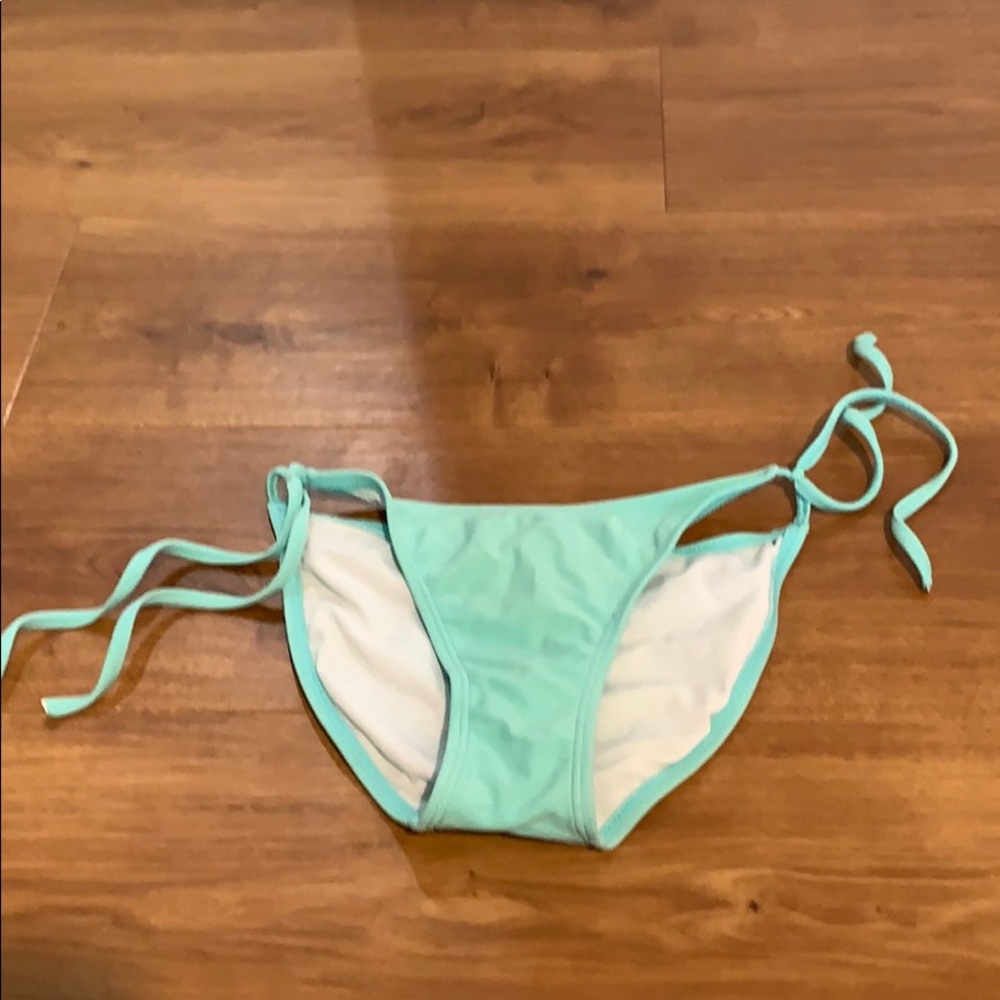 teal bathing suit bottoms with ties sides